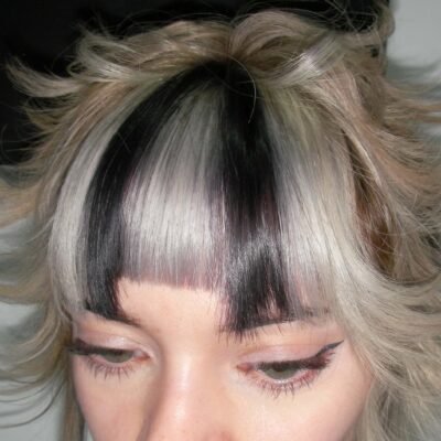 A triple-process creative color with bold fung bangs, captured at Assort London, inspired by anime aesthetic